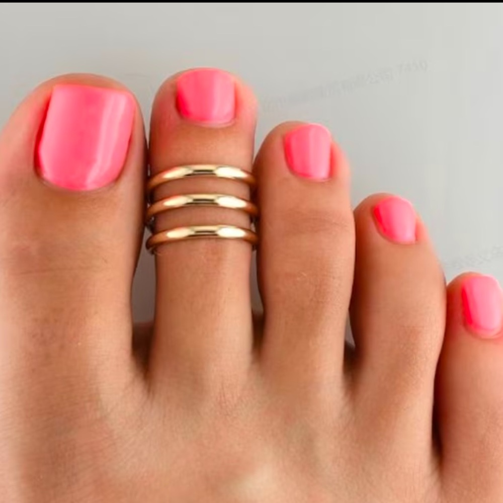 Woman’s One Piece Spiral Adjustable Toe Ring. (Silver Only)
